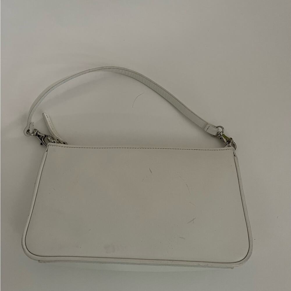 Loft Pre loved Small White Bag with zipper. Few snags on the bag.